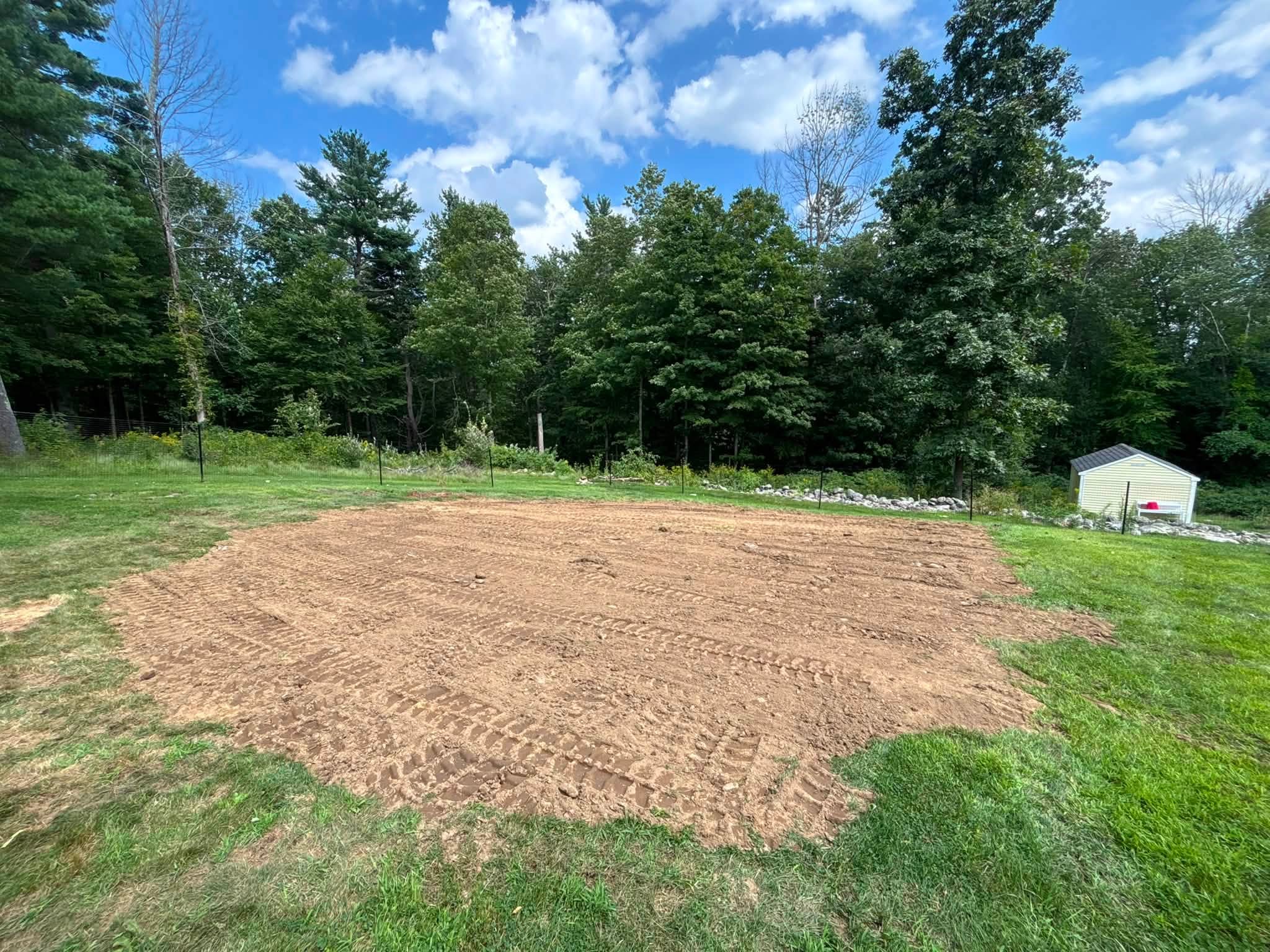 Pool base and surrounding yard before work — Spencer, MA